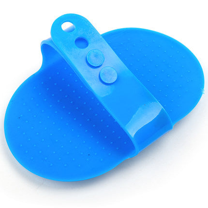 Blue oval pet bath brush with adjustable hand strap